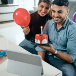 Man and woman celebrating virtual birthday
