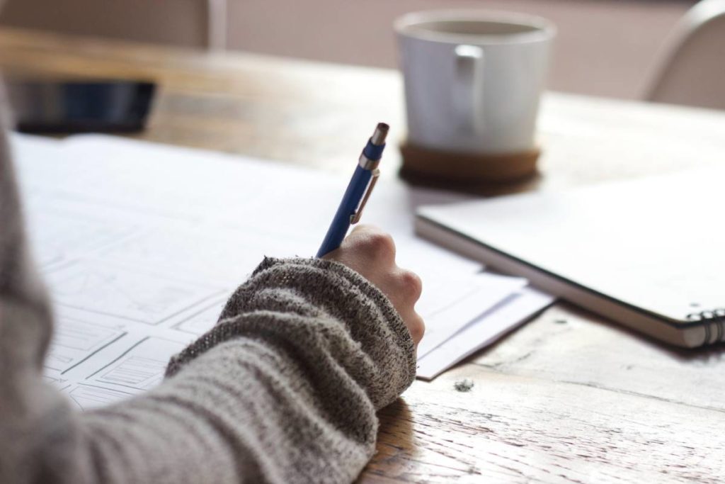 Person writing note