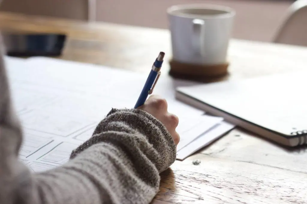 Person writing note