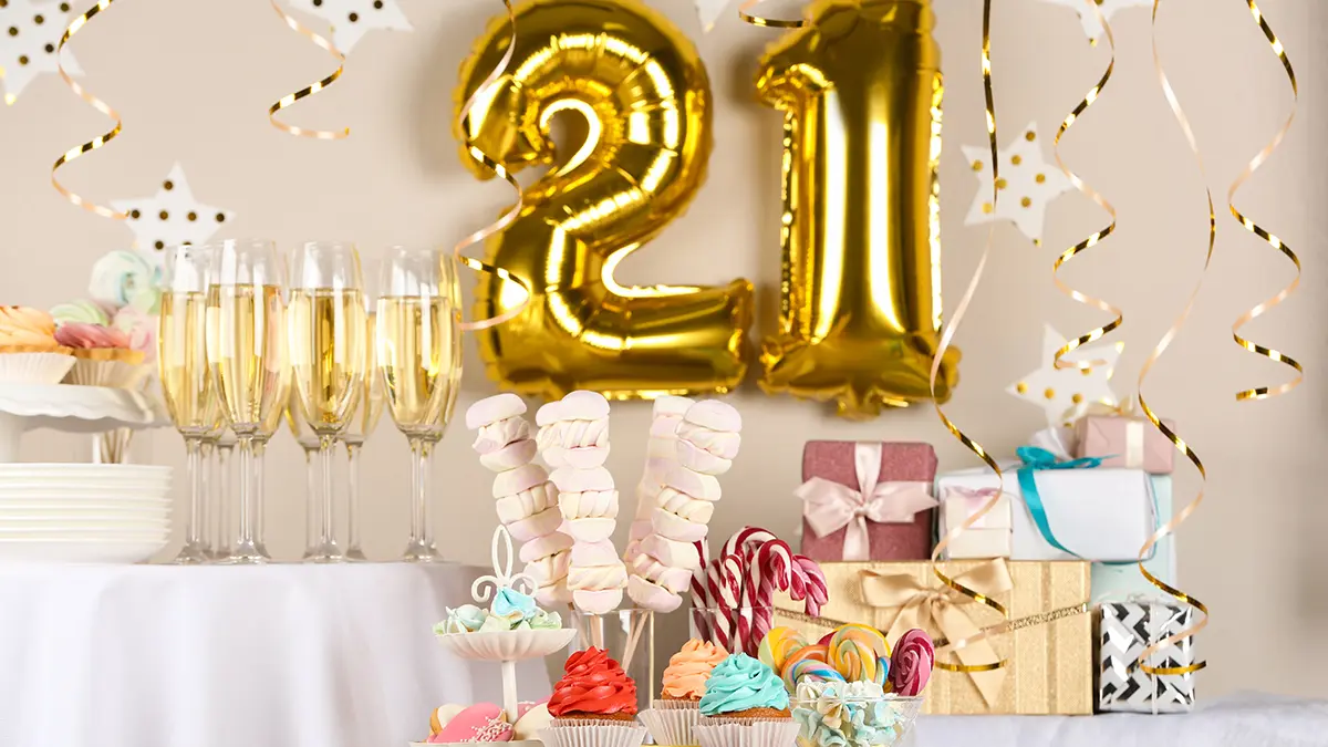 photo of birthday milestones with 21-shaped balloons for milestone birthday