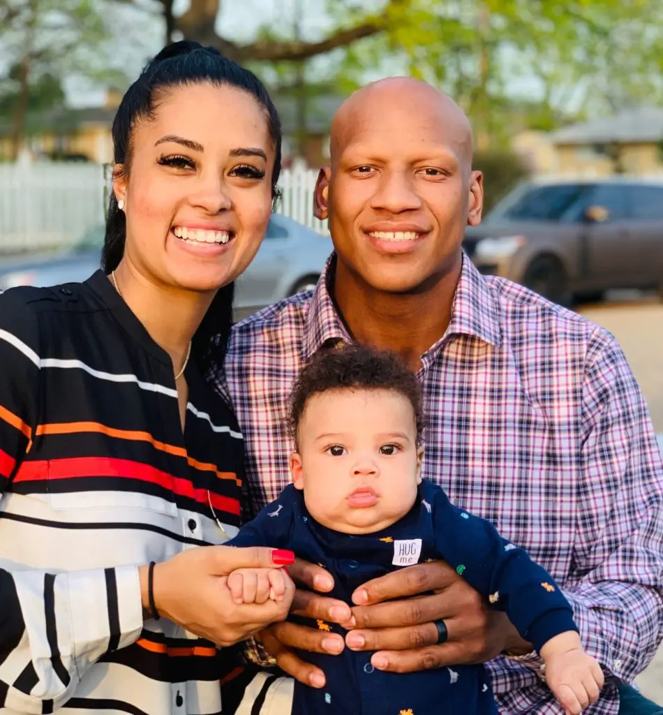 Michelle and Ryan Shazier pose with their child