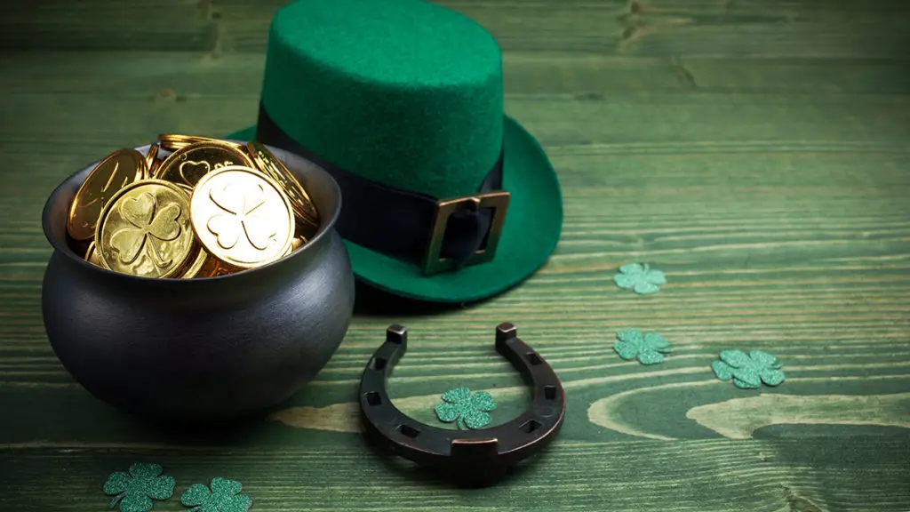 Gold coins and green hat