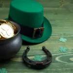 Gold coins and green hat