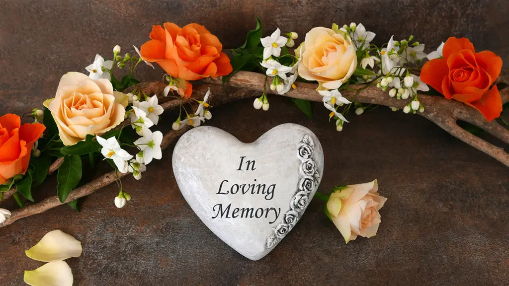 memorial ideas with flowers and a memorial stone