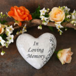 memorial ideas with flowers and a memorial stone