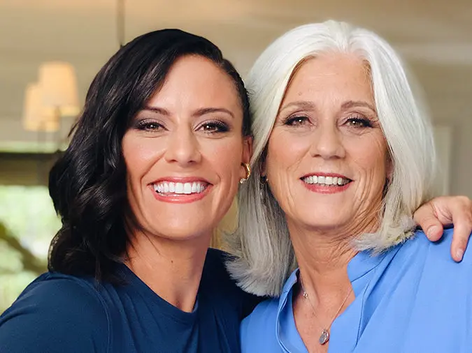 Soccer star Ali Krieger poses with her mother, Debbie Alongi