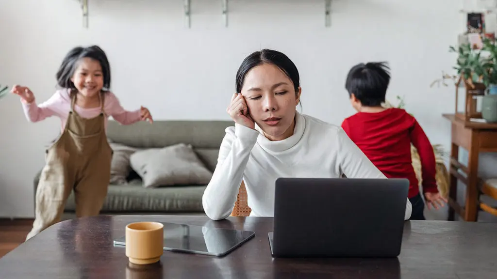 Tired mom with two kids