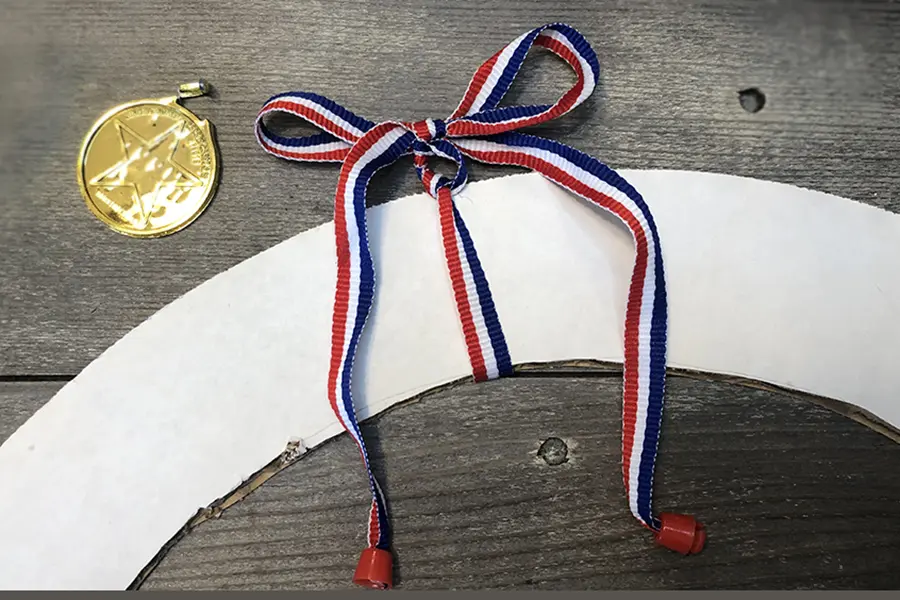 DIY Memorial Day Crafts with Ribbon on wreath cutout