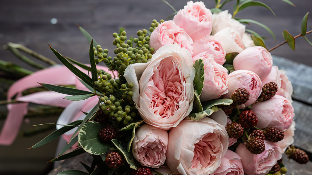 Wedding bouquet with peonies and roses