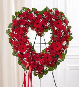 sympathy rituals with red floral heart