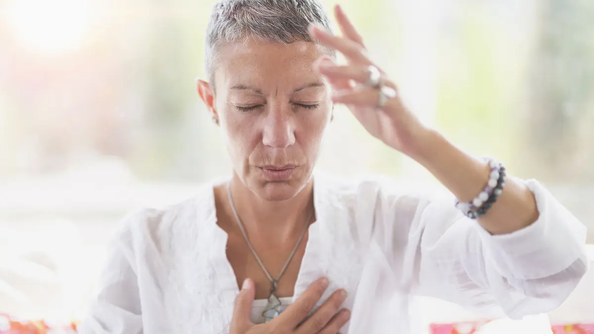 Photo of a woman meditating