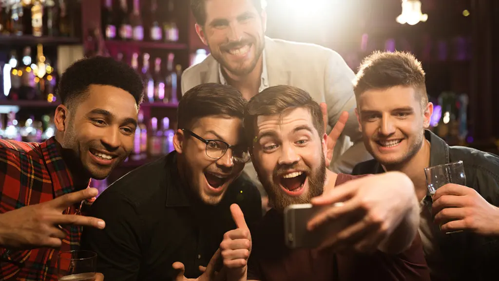 Men taking a selfie