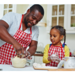 Dad and daughter baking