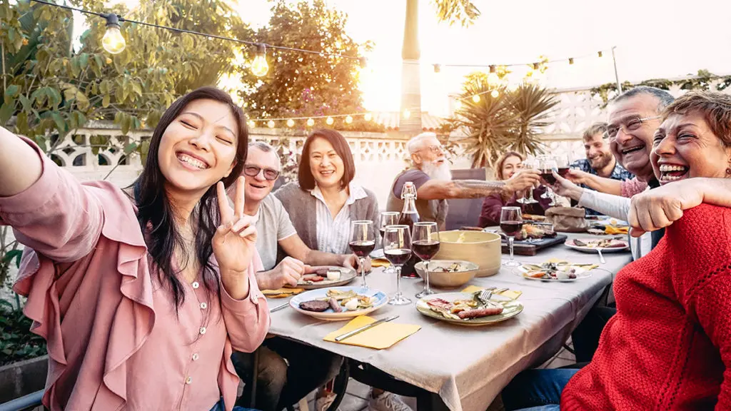 Family eating dinner outside