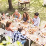 Family eating dinner outside