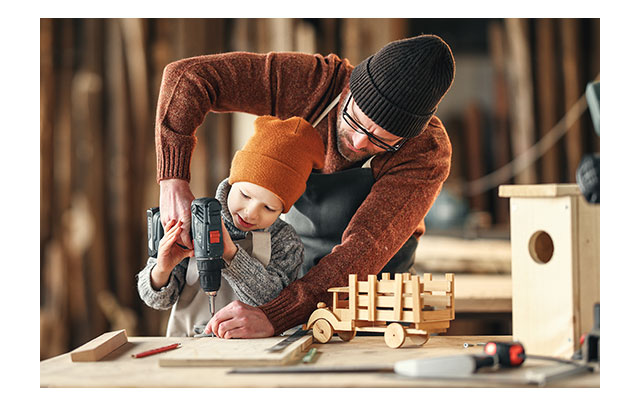 https://www.flowers.com/blog/wp content/uploads///Father and Son Working on Project