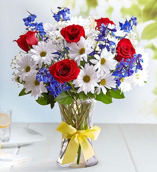 photo of fourth of july with red, white, and blue flowers