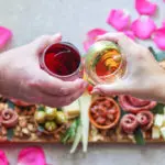 Photo of charcuterie board with wine and charcuterie board