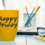 a photo of summer fridays with a happy friday mug