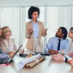 Photo of a meeting at a diverse workplace, illustrating the importance of workplace diversity.