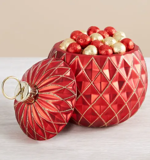 Photo of a red flower vase that can hold potpourri and other items