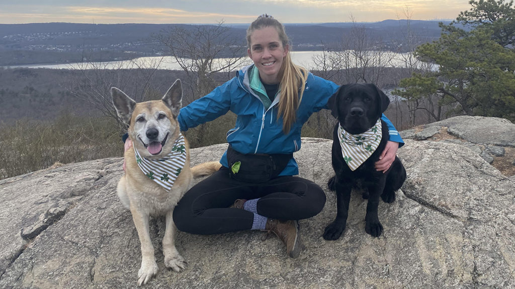 Photo of Heather Myers, an expert on pet sympathy messages, with her dogs Hope and Sailor.