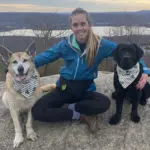 Photo of Heather Myers, an expert on pet sympathy messages, with her dogs Hope and Sailor.