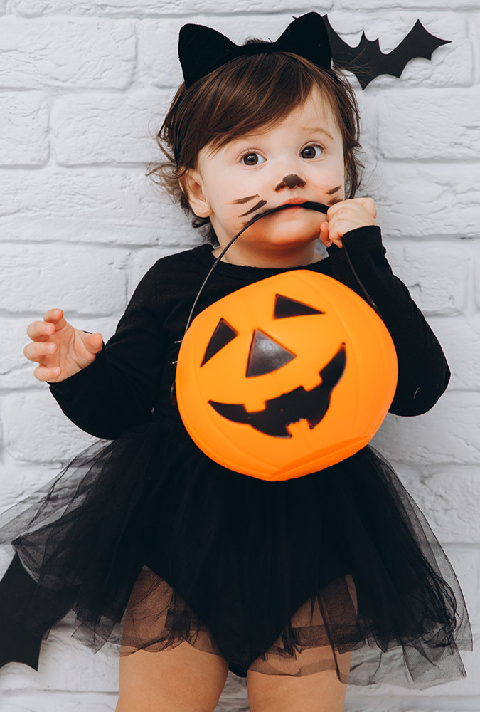 Picture of little girl in a black cat costume