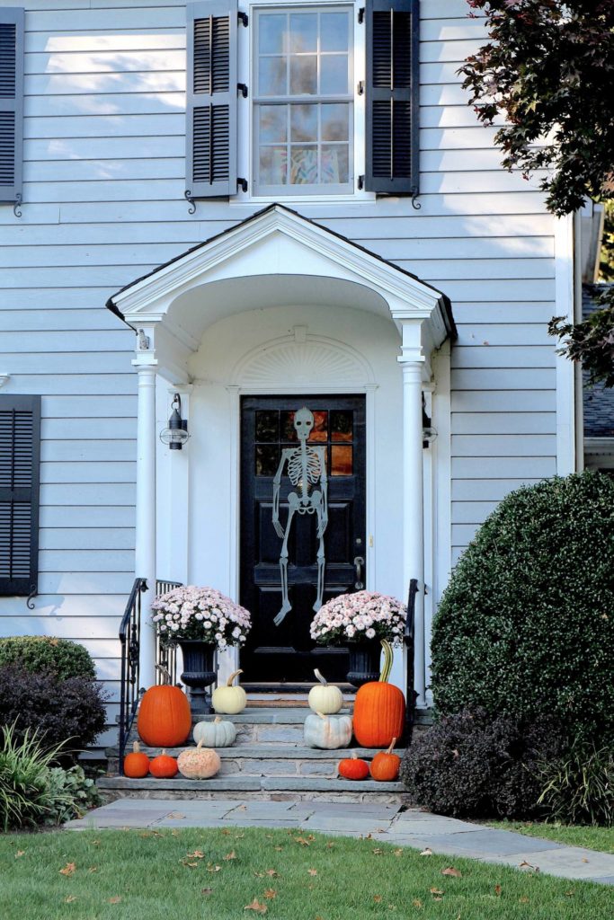 Picture of front porch for fall with skeleton
