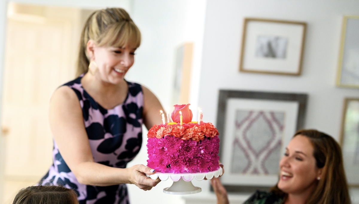 Photo of flower birthday cake, a component of the dinner party theme