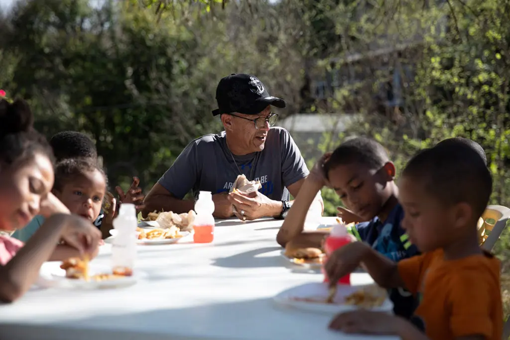 photo of children eating lunch at a table