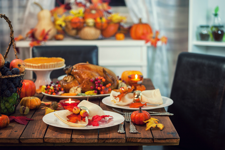 Picture of a Friendsgiving table with turkey