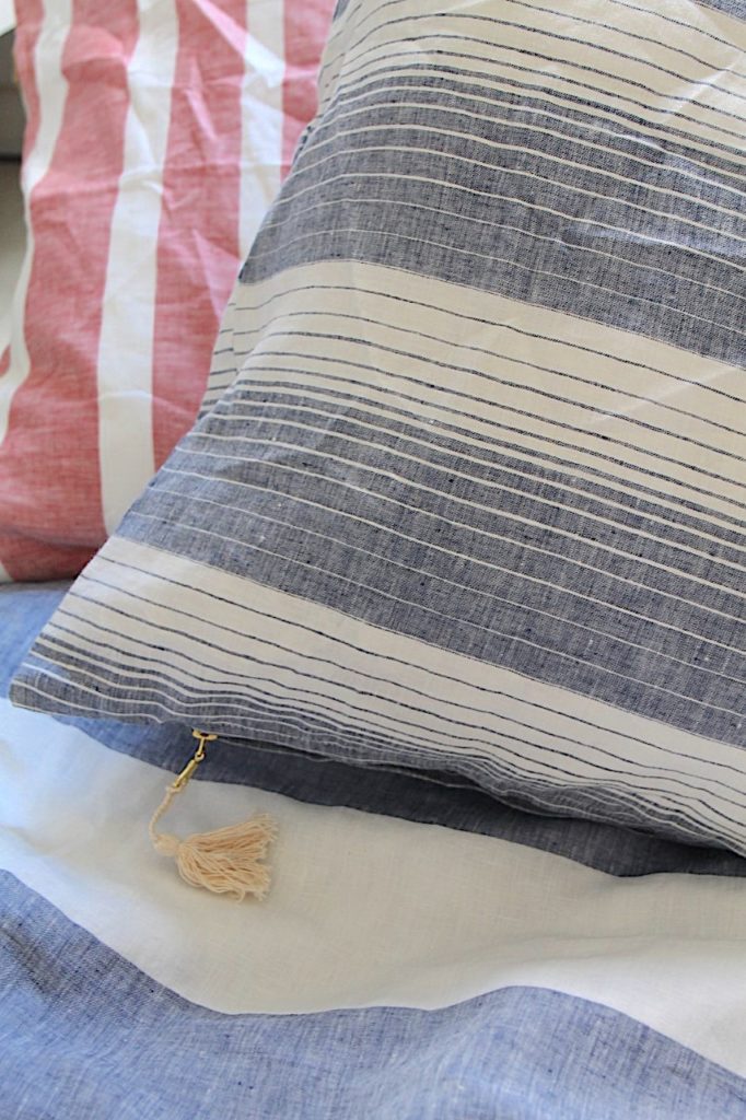 A photo of striped Euro-sized pillows