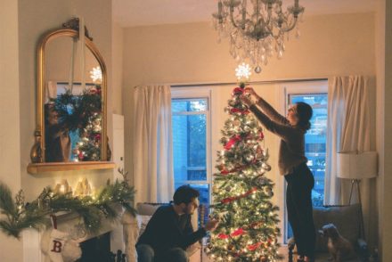 Picture of holiday decorator with tree