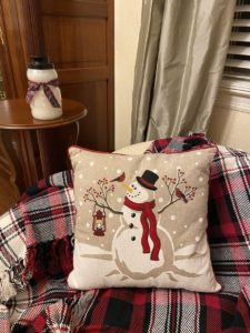 Christmas vignette with snowman pillow