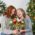 trending christmas flowers and wreaths hero
