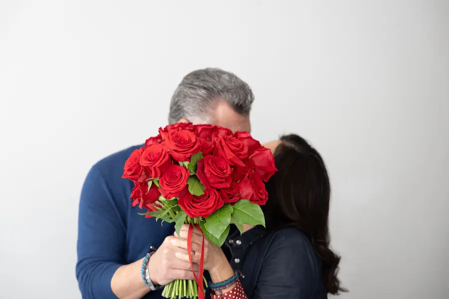 Photo of a couple who share love story about meeting thanks to NFL kiss cam