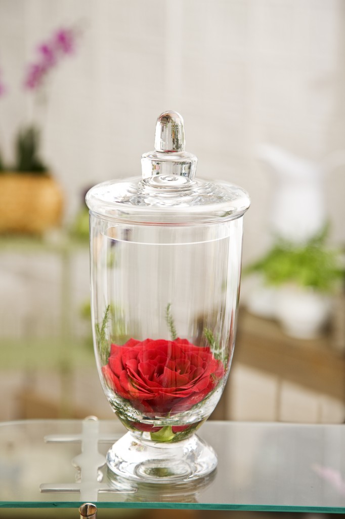 Make your Valentine's Day Flowers last in an apothecary jar with a rose at the bottom.