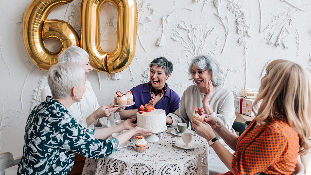 a photo of why every birthday is special: friends celebrating a 60th birthday