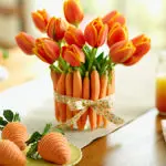 a photo of easter brunch ideas: carrots, tulips, and chocolate dipped strawberries