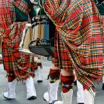 celebrate your irish roots with Saint Patrick's Day parade drummers in tartan kilts