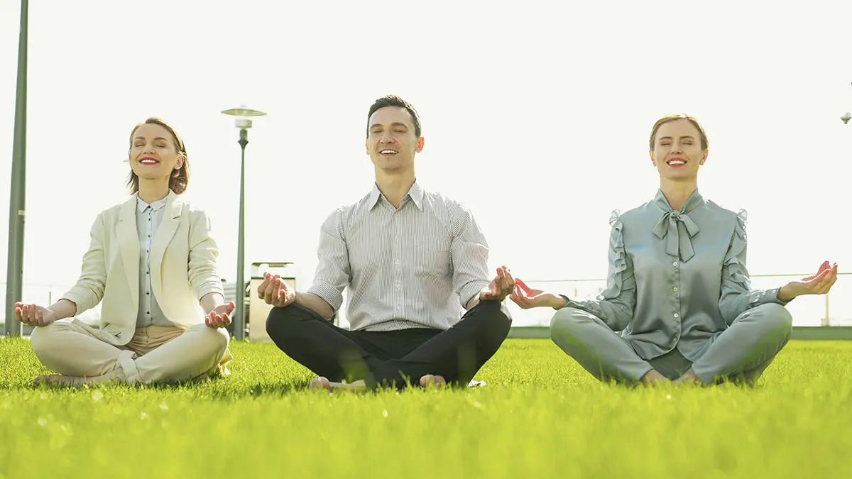 employee engagement activities with co-workers doing yoga