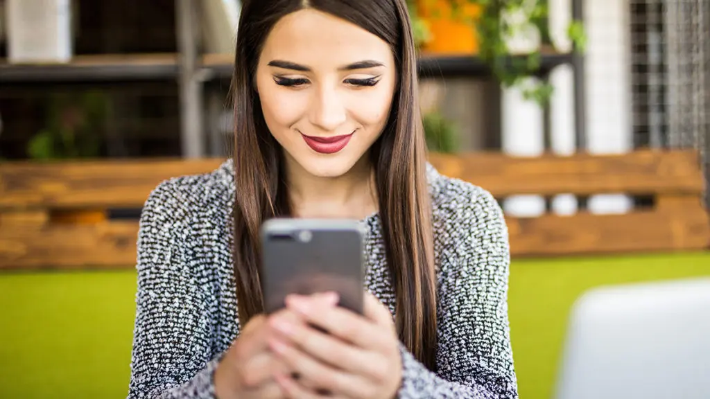 Photo of a woman deciding whether to send an unsent message