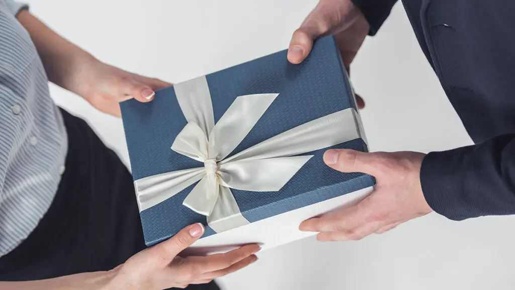 a photo of gift ideas for administrative professionals' day: exchanging a gift