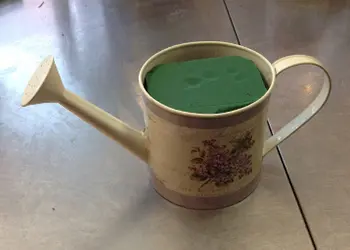 a photo of a DIY Mother's Day floral arrangement: floral foam