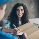 a photo of a student receiving a care package