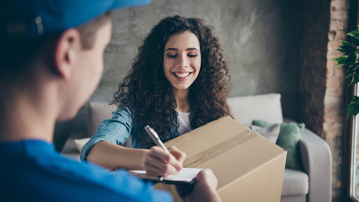 a photo of a student receiving a care package