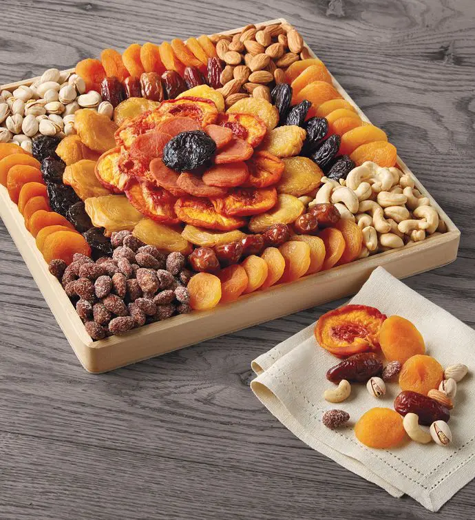 a photo of a finals care package: fruit and nuts tray