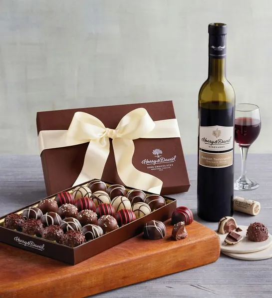 a photo of wine and truffles