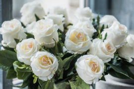 a photo of rose quotes with a bouquet of white roses